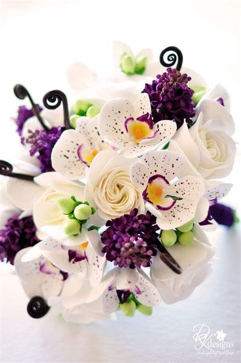 It is difficult to imagine a holiday without fresh flowers, properly designed, matched to the overall style of the event. DK Designs: Plum, Brown, Green and White Wedding