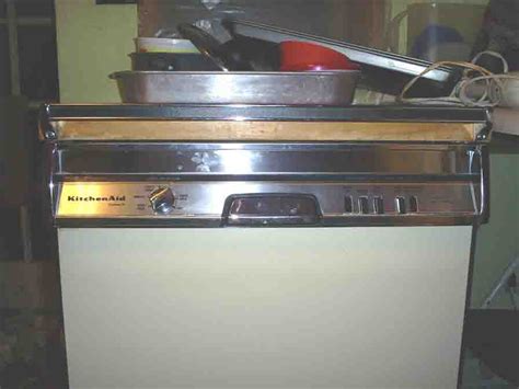 Kitchenaid model numbers are usually found inside the machine, on the back, or on the door. KitchenAid Dishwasher....Should I?????