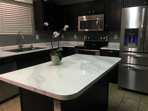 You will need at least two coats of paint, possibly more if you are painting with pure white paint. Dark cabinets, white counters | Kitchen remodel ...