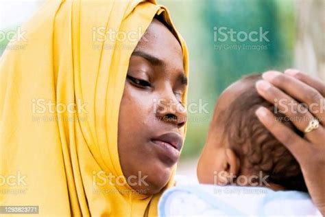 Muslim Mother Holding Her Baby Stock Photo Download Image Now Baby