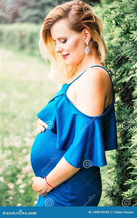 pregnant beautiful woman posing in the park stock image image of expecting forest 149018165