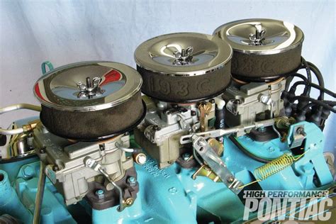An Image Of A Car Engine With Four Wheels On Its Head And Two Valves