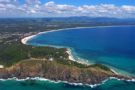 Byron bay, byron bay, new south wales. Elderly rock climber runs out of steam at Cape Byron ...