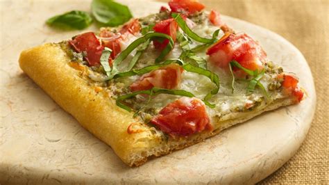 Quick n easy homemade pizza recipe. Tomato Pesto Pizza recipe from Pillsbury.com