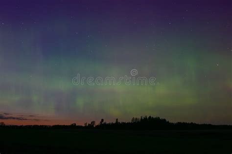 Northern Lights And Its Reflection The Lake Northern Lights Shimmer