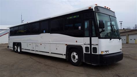 2003 Mci Dl 57 Pax Charter W Wc Lift Buses For Sale