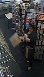 Cctv Footage Shows Woman Shoplifting Multiple Express Post Envelopes Daily Mail Online