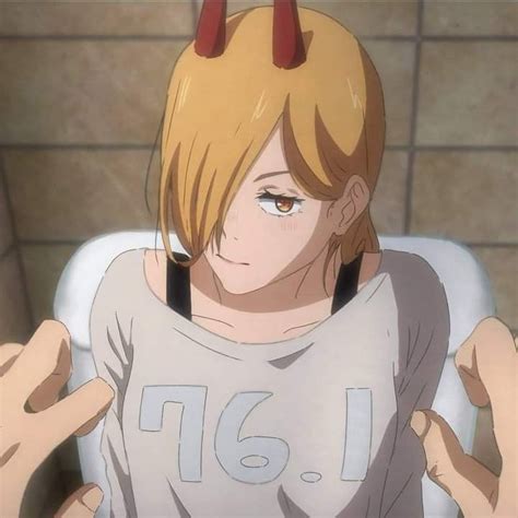 An Anime Character Sitting In A Chair With Horns On Her Head And Hands