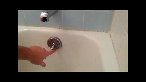 My 2 yr old was having the same issues. Bath tub trip lever/ bath tub stopper replacement or ...