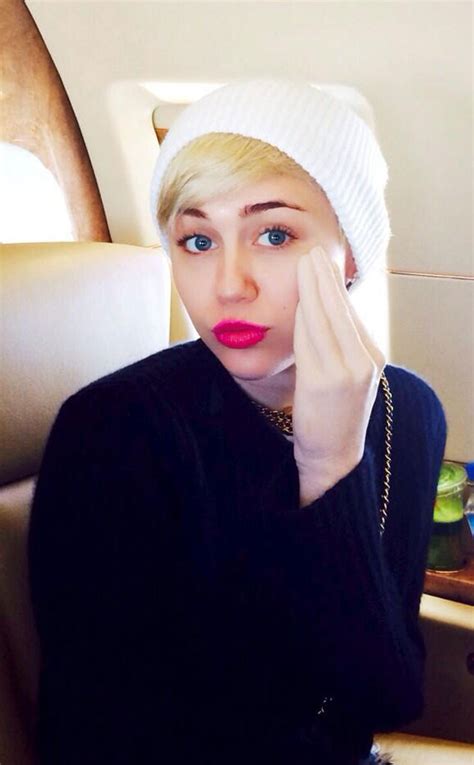 Miley Cyrus Caresses Her Face And Rubs Her Thighs With Hand Of Adonis Dildo—see The Pics E News