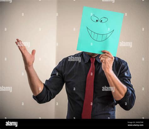 Hiding Smiley Emotion Hide Smiley Faces Emotions Stock Photo Alamy