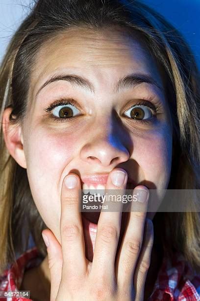 woman shocked hand over mouth photos and premium high res pictures getty images