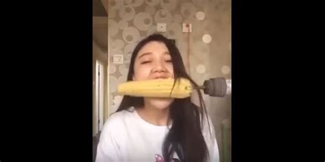 Girl Tries To Eat Corn On Cob Off A Drill