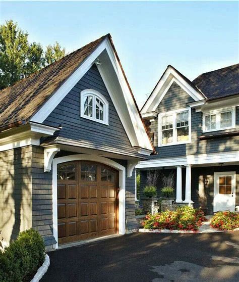 Maybe you would like to learn more about one of these? Slate blue and warm wood | Exterior house colors, House ...