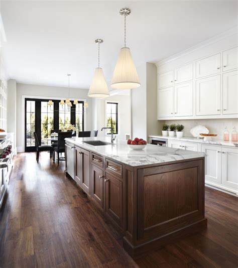 When you see tan floors with strong wood grains, such as you have in some oaks and walnuts, you plus, the cabinets will be directly on top of the floor. Lyndhurst - Kitchen | The Design Co. | Modern walnut ...