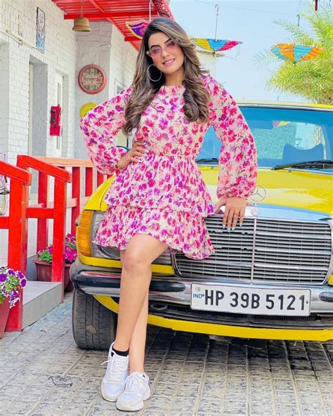 Download Akshara Singh Flower Dress Wallpaper