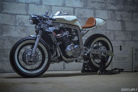 Check out this awesome custom cafe racer! Cafe Racer - SUZUKI GSX-R 1100 "101" by KMPMotorCycleTuned