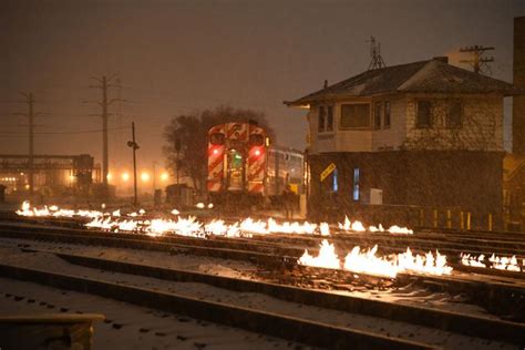 Chicago City Officials Use Fire On Tracks To Keep Trains Operating