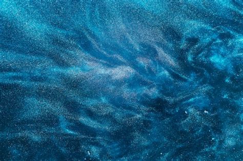 Free Photo Swirls Of Azure Paint On Water