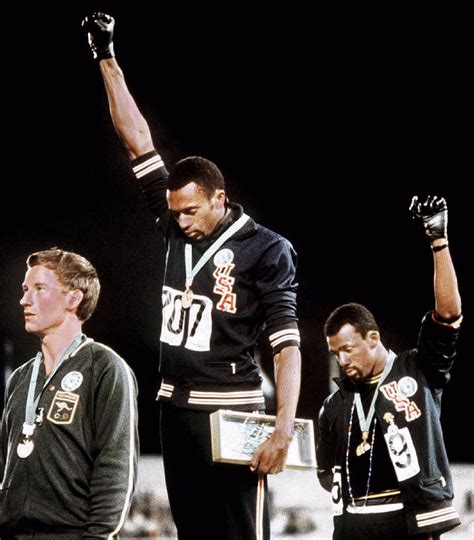 John Carlos Right Afro Cuban Descent Raises Black Power Fist W Tommie Smith At The 1968