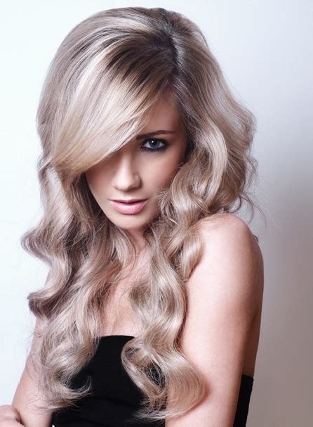 Gently tug the side pieces of your style to guide them higher up your head for more volume and drama. Sexiest Long Hairstyles 2012|