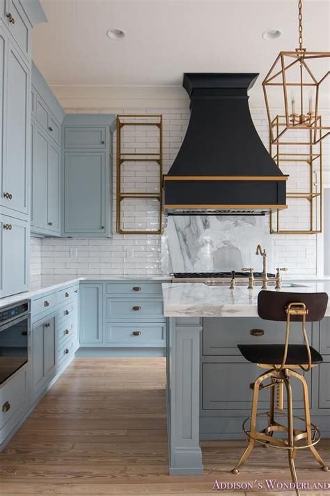 White cabinets modern blue grey kitchen. 50% of Sherwin Williams Stardew and 50% Uncertain Gray ...