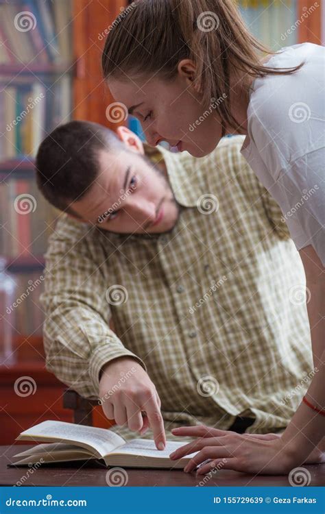 Boy Explains To The Girl A Lesson In The Classroom Stock Image Image