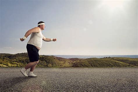 Fat Guy Running Stock Photos Pictures And Royalty Free Images Istock