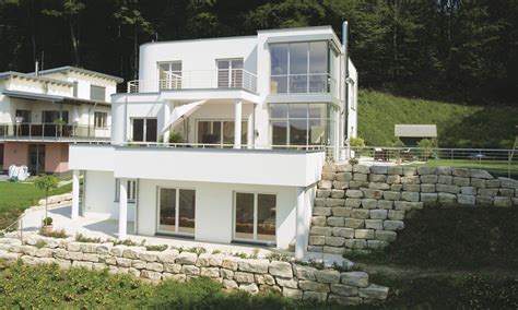 Durch ein grundstück in hanglage sichert sich der bauherr oft einen großartigen ausblick über die landschaft. haus am hang bauen - Szukaj w Google | Skarpa | Pinterest ...