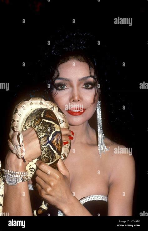 Latoya Jackson Photographed At A Playboy Magazine Event Holding A Snake