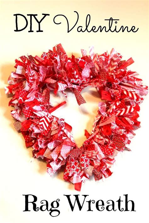 A Valentines Day Wreath Made Out Of Red And White Ribbons With The