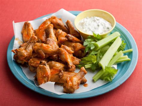 We've got the solution to crispy chicken wings without the hassle of deep frying. Buffalo Wings Recipe | Alton Brown | Food Network