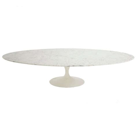 In his pedestal collection, which includes a dining, coffee and side table, saarinen realized his ideal of formal unity: Eero Saarinen Custom Tulip Coffee Table at 1stdibs