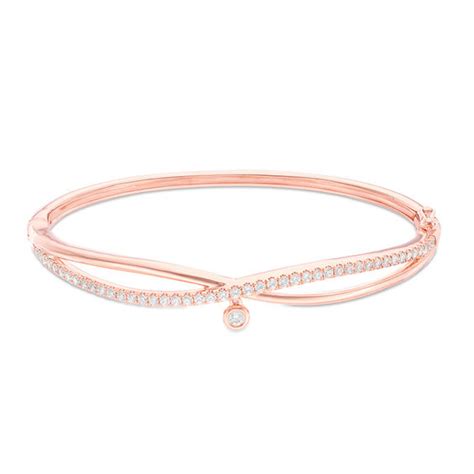 Hot promotions in gold jewel rose bracelet on aliexpress if you're still in two minds about gold jewel rose bracelet and are thinking about choosing a similar product, aliexpress is a great place to compare prices and sellers. 1 CT. T.W. Diamond Crossover Bangle in 10K Rose Gold | Zales