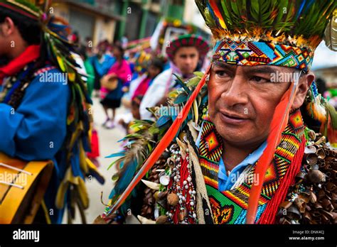 a colombian kamentsá shaman wearing a colorful costume takes part in the carnival of