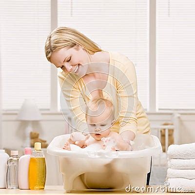 Mother Give Baby Girl A Bath Royalty Free Stock Photo CartoonDealer Com
