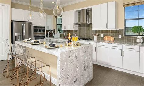 Modern Kitchen With Summerhill Quartz Countertops And White Cabinets 12