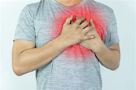 Asian Man Pressing Chest With Painful Expression Severe Heartache