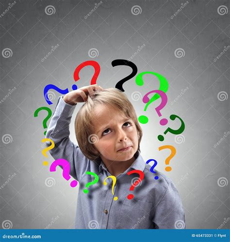 Confused Boy Thinking With Question Mark Around His Head Stock Photo