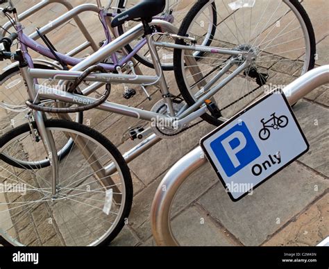 Bicycles Chained To Bike Rack In Nottingham City Centre England Uk