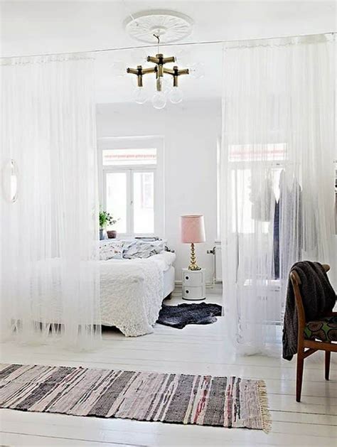 It divides a space without being a permanent, solid wall. 15 DIY Room Dividers To Style, Organize and Conquer Your Space