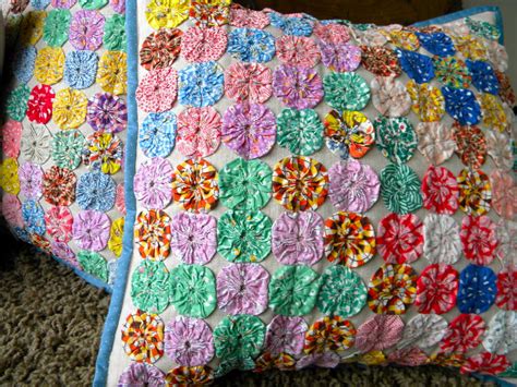 Maybe you would like to learn more about one of these? Sew Kind Of Wonderful: Old Yo Yo Quilt Blocks