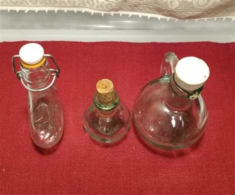 vintage clear green tinted glass bottles set of three etsy