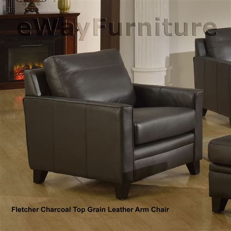 The rich charcoal gray bonded leather is accented with silver nailhead trim in this set of two dining chairs. Fletcher Charcoal Top Grain Leather Arm Chair
