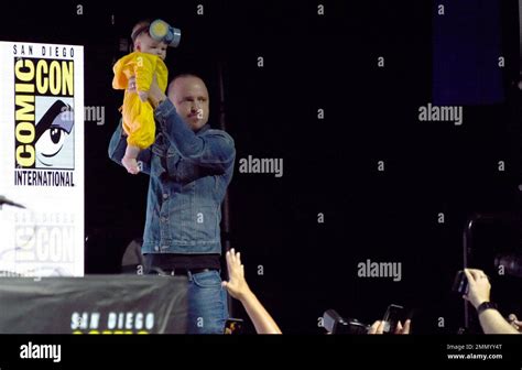 Aaron Paul Holds His Daughter Story Annabelle In The Air As She Is