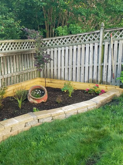 Greenes fence raised garden bed expandable multiple tiers wood brown. Raised Garden Bed Against Fence - Remodelando la Casa