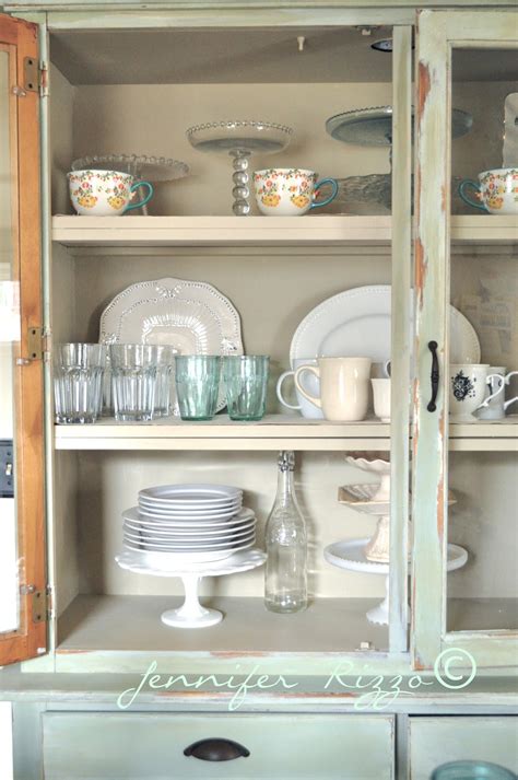 This can be done using pieces of wood that are painted to match your cabinets. How to make a new piece of furniture look old with paint and distressing...Kitchen hutch reveal ...