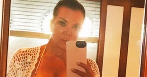 kris jenner defies her 61 years of age with jaw dropping bikini picture showing toned stomach