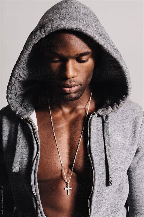 African Male Model Looking Down By Stocksy Contributor Jacob Lund Stocksy