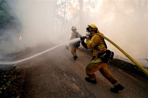 Firefighters Battle To Save Communities From Epic California Fire